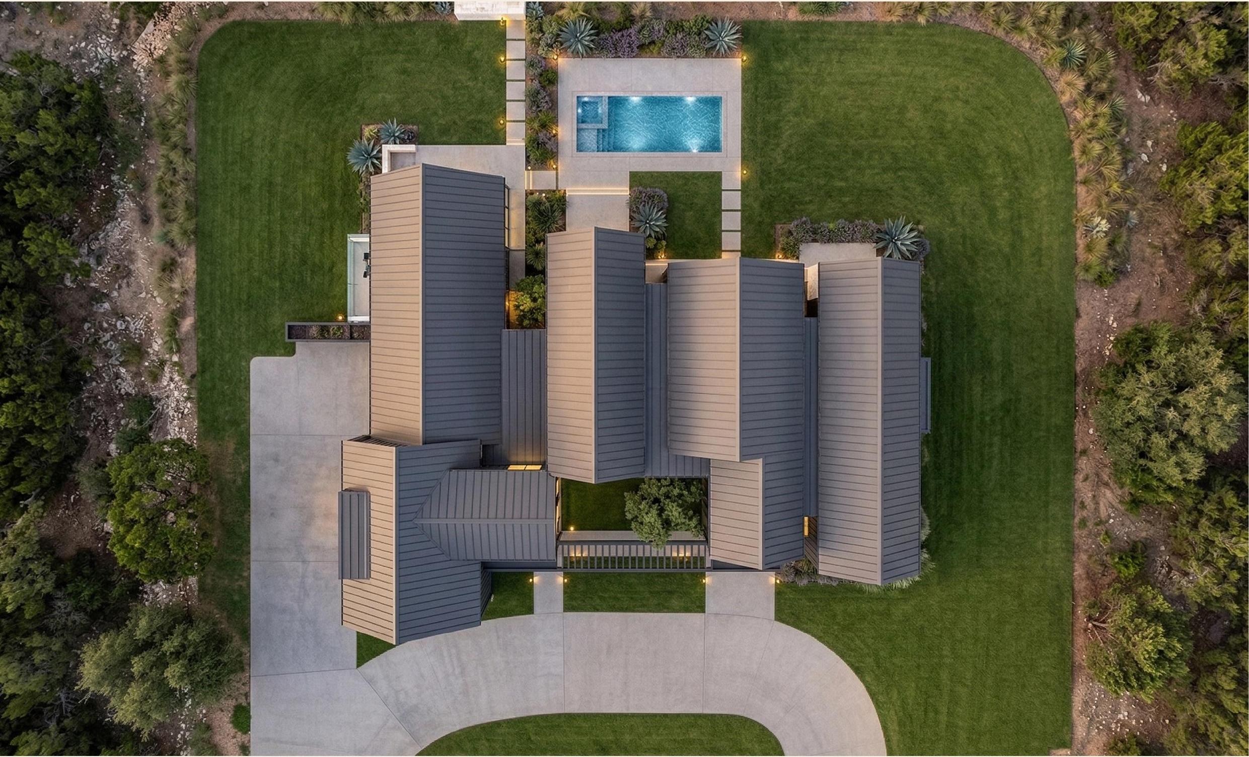 Top-down aerial view of the Sovereign Seven Ranch, pool, and grounds